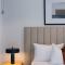 Elevated Luxury at QWR City & River Views