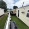 Bright Family Caravan with Deck & BBQ at Seawick Holiday Park, Clacton