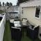 Bright Family Caravan with Deck & BBQ at Seawick Holiday Park, Clacton