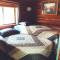 Cozy Cub Log Cabin - Year Round Tranquil Beauty