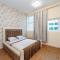 Luxury 2 bedroom next to beach with swimming pool gym and kids play area