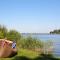 Villa in Friesland with Waterfront Jetty