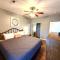 Lakefront and Lake View Indian Point Condo with Boat Slip