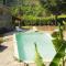 Charming stone house with shared pool, Chambonas