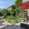 Les Bellevue Cité "3 Apartments, 1 with Garden & Private Parking, Aircon, WiFi, Free Public Car Park, 1 km from Cité"