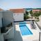 Villa Lumaka Sun - Amazing Home In Brodarica with 4 Bedrooms, Wifi, Outdoor Swimming Pool and Heated Swimming Pool
