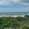 3rd-row beach cottage with ocean views, beach access, deck, & grill