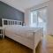 Familie appartement met 2 SLK op 50 meter van het strand