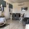 Stylish 3BR apt - modern decor balcony & pool - close to the beach and amenities