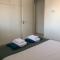 Stylish 3BR apt - modern decor balcony & pool - close to the beach and amenities