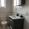 Stylish 3BR apt - modern decor balcony & pool - close to the beach and amenities
