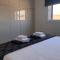 Stylish 3BR apt - modern decor balcony & pool - close to the beach and amenities