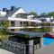 Plażowa Park Apartment with Garden by Noclegi Renters