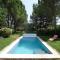 A pretty family house located in a tranquil area with a pretty view of the Luberon range.