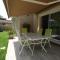 A pretty family house located in a tranquil area with a pretty view of the Luberon range.