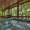 Bearfoot Ridge Wood-burning fireplace cozy hot tub serene views