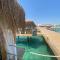 Emerald seaside residence at Four Seasons