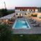 Villa Pietra- Modern rustic poolside oasis
