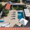 Villa Pietra- Modern rustic poolside oasis
