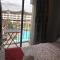 1 Bedroom unit with balcony and facing amenities and just beside SM Ecoland