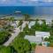Decked Out - Stunning Home Huge Sunny Resort Style Heated Pool Walk to Pine Ave Beach