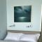 Haus am Meer App104 mit Meerblick und Balkon