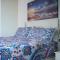Pampered In Paradise Columbus Heights 2 BR penthouse condo near Ian Fleming airport