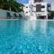 Renovated TRANQUIL Sea View Studio with Balcony, Infinity POOL, Overwater Deck & Kitchenette, 2nd Floor