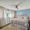 Luxury heated-pool home blocks from the beach