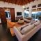Relax At This Hillside Retreat That Overlooks The Lush Forest And The Caribbean,