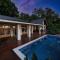 Relax At This Hillside Retreat That Overlooks The Lush Forest And The Caribbean,