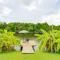 Port Charlotte Home with Sunroom, Grill and Fire Pit!