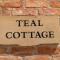 Teal Cottage