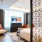 Yuexiu Hotel Guangzhou,Curio Collection by Hilton-Free shuttle between hotel and Exhibition Center during Canton Fair & Exhibitor Registration Counter