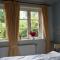 Ferien unterm Reetdach Whg 02