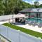 Luxe Jupiter Home with Pool House, Near Golf and Beach