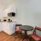 Breezy Naples Studio Condo with Screened Porch!