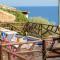 Villa Patty with infinity pool in front of the sea, parking and wifi