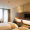 Foto: Home Inn Plus Shanghai Yushan Road Yuanshen Sports Center 2/27