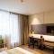 Foto: Home Inn Plus Shanghai Yushan Road Yuanshen Sports Center 6/27