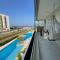 Home 1 | Ap Cinema Frente Mar com Piscina Aquecida em Bertioga