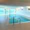 Ferienwohnung direkt am Meer mit Pool und Sauna, Strand fußläufig erreichbar, barrierefrei