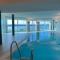 Ferienwohnung direkt am Meer mit Pool und Sauna, Strand fußläufig erreichbar, barrierefrei