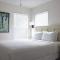New Casa Caribe by Brightwild- Two-Story Condo Rooftop Pool