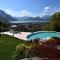 Villa in Pisogne with pool, garden and lake view