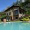 Villa in Pisogne with pool, garden and lake view