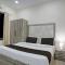 HOTEL O AMR GRAND Govindpuri Junction