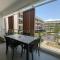 One-Bedroom Apartment and Luxury Penthouse in a Poolside Complex
