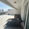 One-Bedroom Apartment and Luxury Penthouse in a Poolside Complex