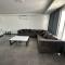 One-Bedroom Apartment and Luxury Penthouse in a Poolside Complex